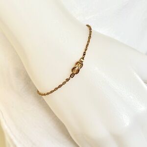 1980s Avon Sailor's Knot gold tone chain bracelet